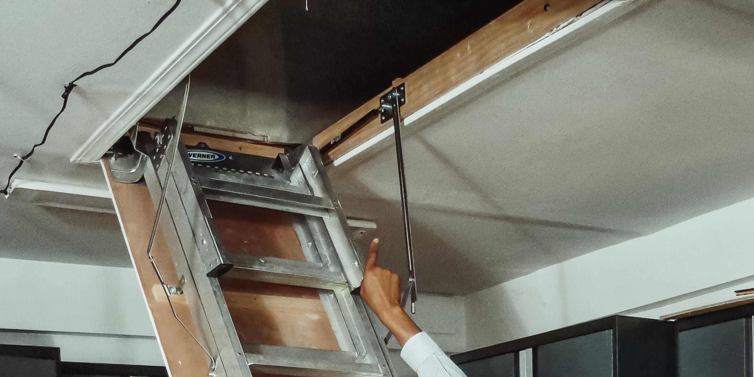 How to Adjust the Springs on Attic Ladder